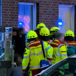 wide_street_urban_emergency_scene_at_dusk_or_night